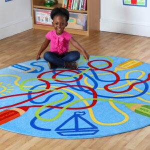 Little girl sat on a circular colour tubes classroom carpet 2m diameter