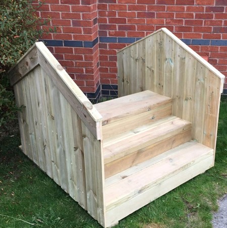 Wooden step bridge for nurseries and primary schools with three steps up and down and solid rails / walls either side