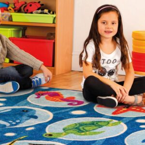 Children sat on an Under the Sea Carpet 3x2m