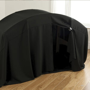 Children's den with a black out kit covering. Kit is a black drape over the top of the den and a black mat on the inside