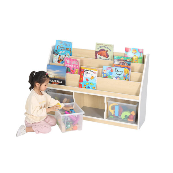 Thrifty 3 compartment book storage with 3 large trays underneath and child putting toys into the middle tray.