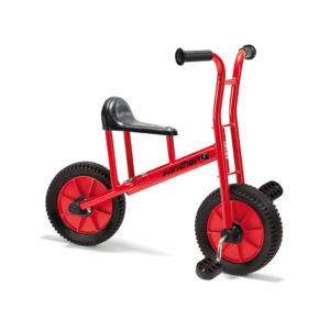 Bright red winter viking children's bicycle which has black solid wheels, a black seat, black rubber handle bar grips and rubber pedals. The handle bars and pedals both attach to the front wheel.