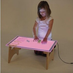 Child playing with Colour Changing A2 Light Panel and Table