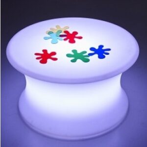 Circular sensory mood table lit up with coloured shapes on top