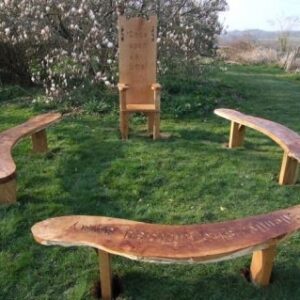 Story Telling Circle including giant throne chair and 3 curved benches.