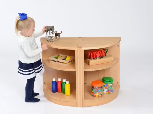 Child standing in front of a Room Scene Curved Corner Unit Set with semi circle front and two shelves with central divider