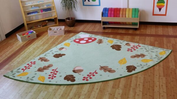 Classroom showing Forest Friends Corner carpet with autumnal leaf design and pale green background