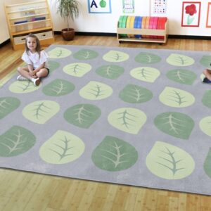 Children in a classroom sitting on a 30 spot 3x3m Leaf Placement Carpet