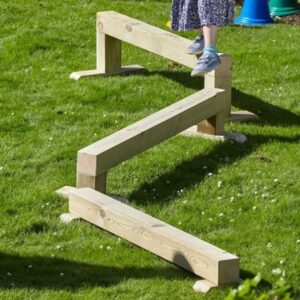 Outdoor Balance Beam Set consisting of three wooden beams with differing heights
