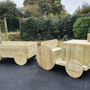 Wooden playground tractor and trailer