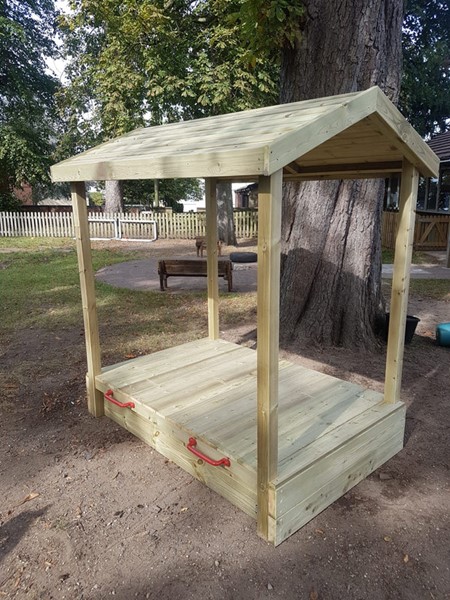 Wooden sandpit shelter with roof, base and lid