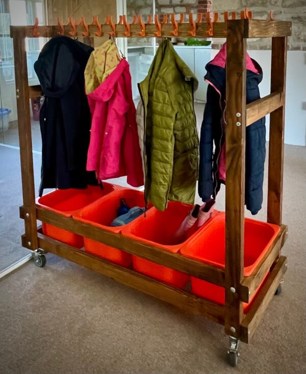 Wooden Mobile Coat Rack with 4 storage boxes below a double sided rack with 30 coat hooks in total