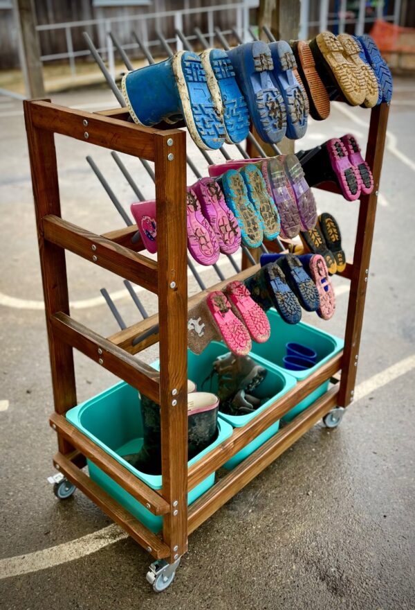 Wooden mobile welly rack with pegs for up to 30 pairs of wellies and 3 storage trays underneath